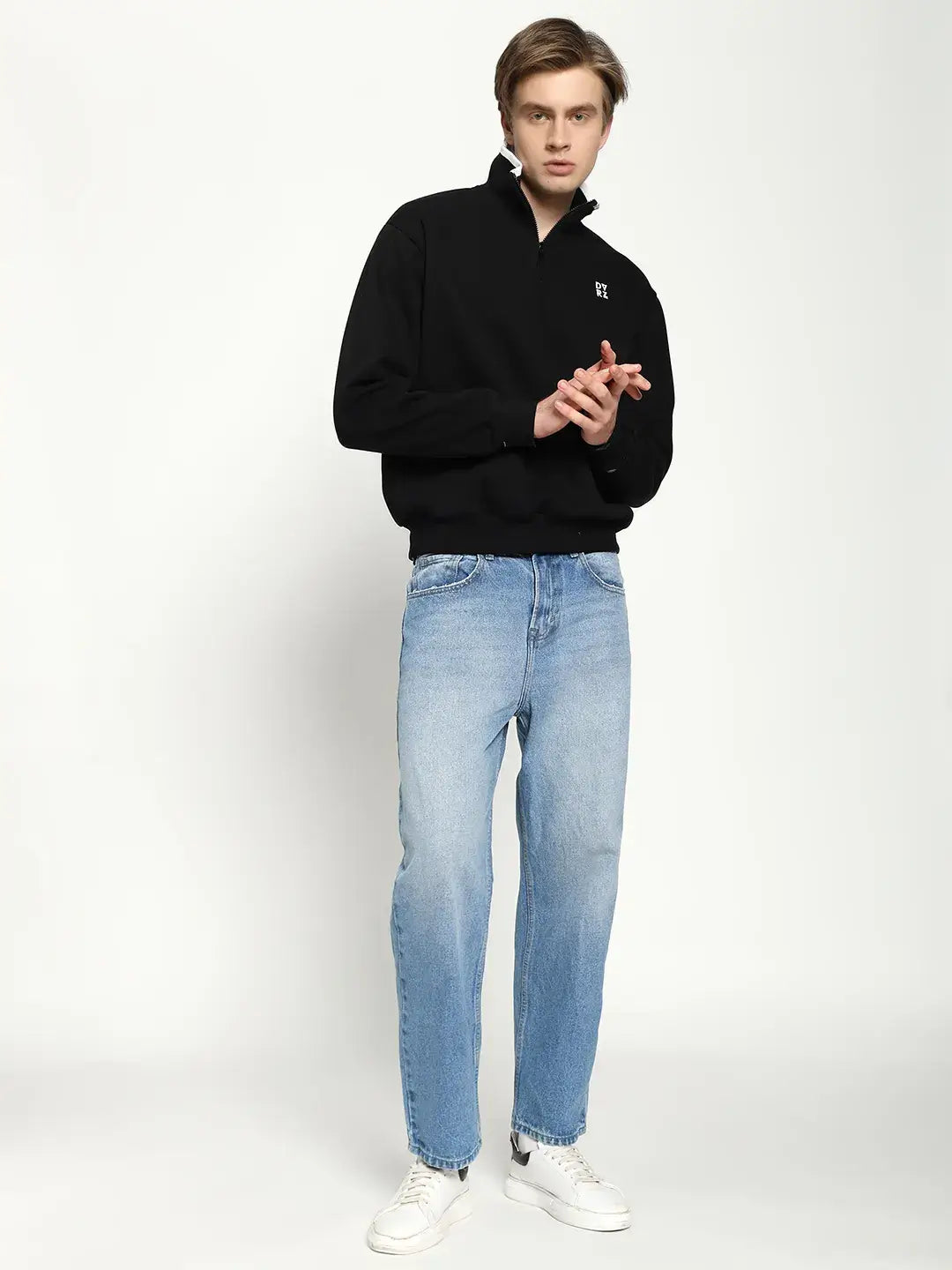 Black Quarter Zip Sweatshirt worn by a model against a grey background, featuring heavy 350gsm fleece, white zipper and ribber cuffs