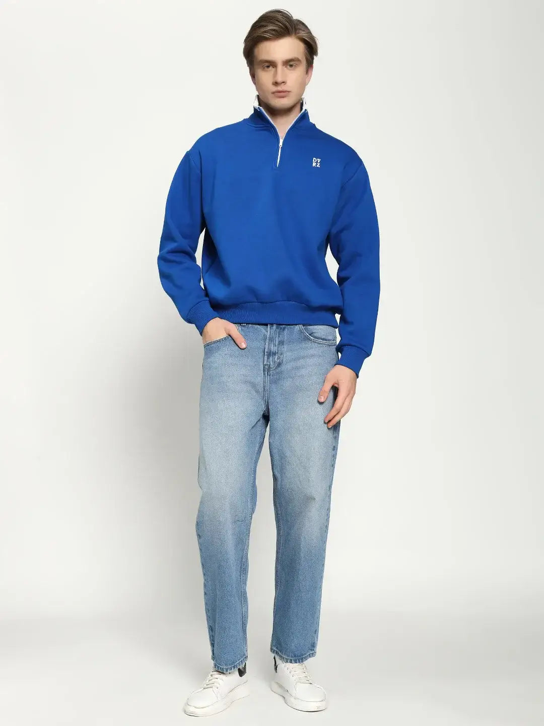 Model wearing DVRZI's Blue Quarter Zip Sweatshirt against a grey background.