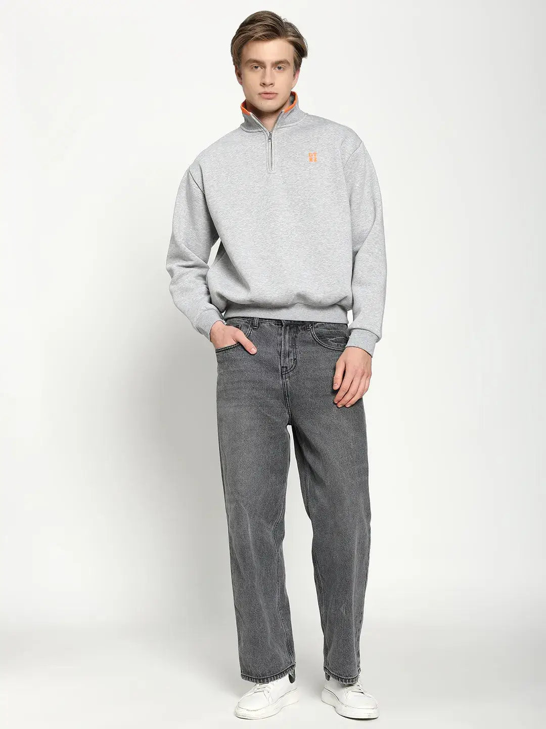Grey Quarter Zip Sweatshirt worn by a model, showcasing a stylish and comfortable minimal streetwear look.